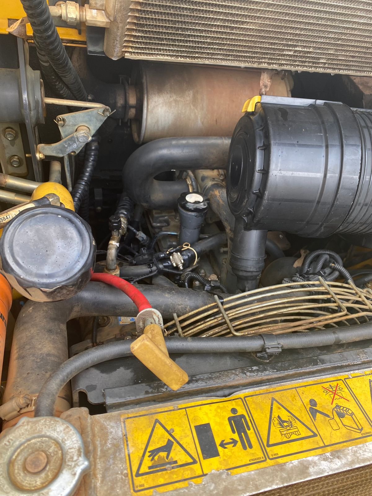 Mini Carregadeira - New Holland - L320